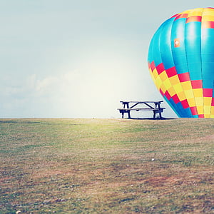 blue, red, and yellow hot air balloon thumbnail