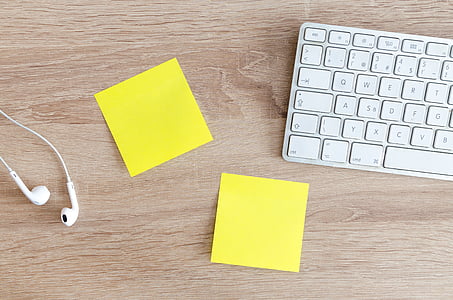 two yellow paper near Apple Magic Keyboard thumbnail