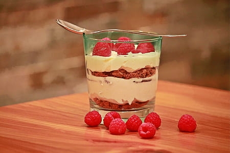 raspberry cream in clear glass with silver spoon on top thumbnail