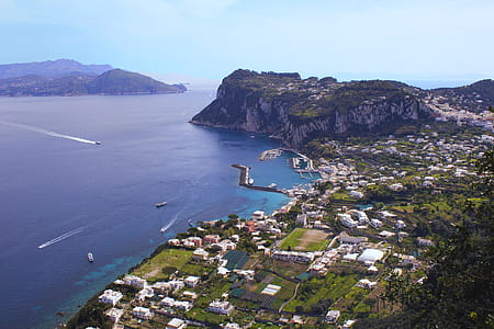 sea near the city at daytime thumbnail