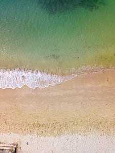 aerial photography of seashore thumbnail