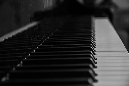 close-up grayscale photo of piano keys thumbnail