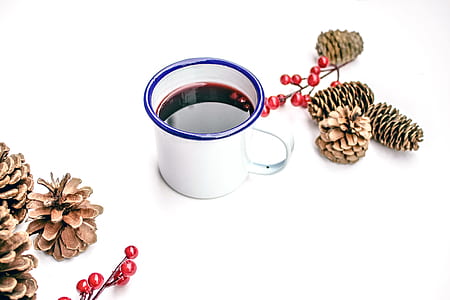 black liquid filled white ceramic mug thumbnail