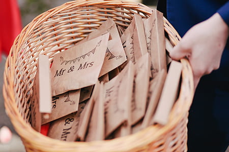 person holding basket of letter thumbnail