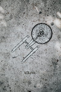 closeup photo of gray Water labeled panel thumbnail