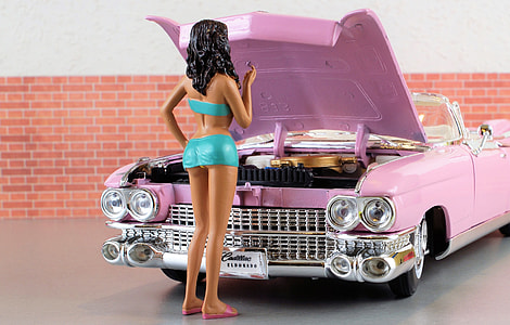 barbie doll woman wearing teal sports bra and skirt thumbnail