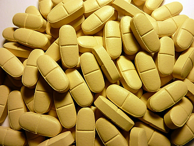 yellow medication tablet lot thumbnail