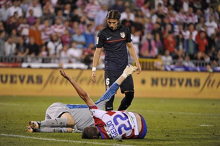 shallow focus photography of soccer players thumbnail