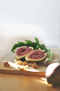 slices of fruit on wooden chopping board thumbnail