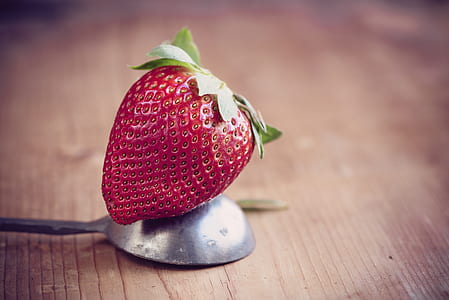 strawberry on gray spoon thumbnail