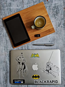 mug filled with yellow liquid on board thumbnail