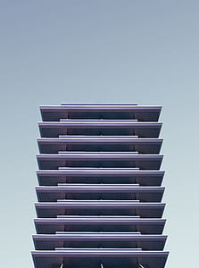 architectural photography of purple building thumbnail