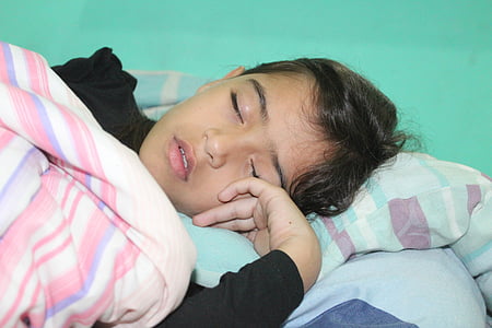 girl laying on bed thumbnail