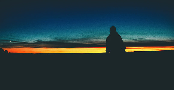 silhouette photo of person during golden hour thumbnail
