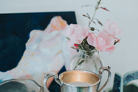 vaseful of pink petaled flowers thumbnail