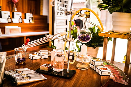gray and yellow metal decor on brown table thumbnail
