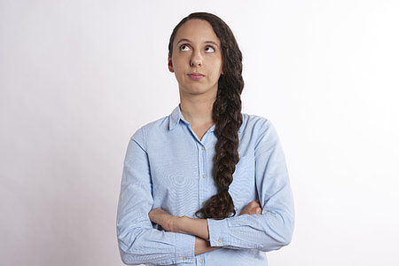 woman braided hair wearing blue button-up long-sleeved shirt thumbnail