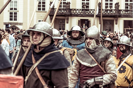 knights walking on plaza during daytime thumbnail