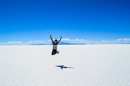 person jumping during daytime thumbnail