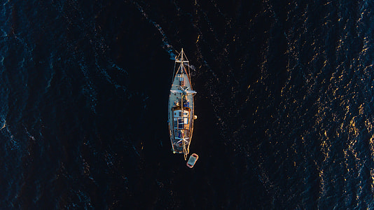 aerial view of ship on body of water thumbnail