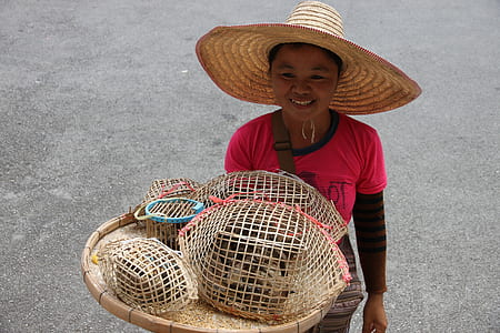 woman carrying brown tray thumbnail