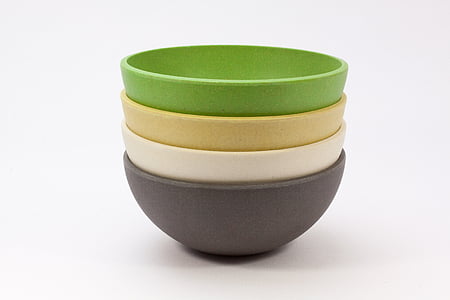 four green, brown, beige, and gray bowls on white surface thumbnail
