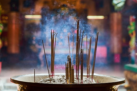 shallow focus of incense sticks thumbnail