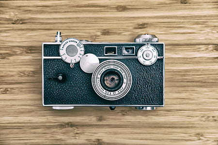 black and gray SLR camera thumbnail
