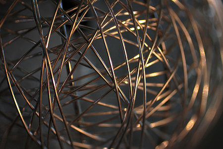 selective focus photography of wire inside mid-dark room thumbnail