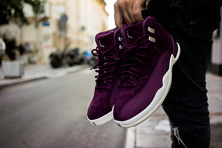 person carry red velvet Air Jordan 12's thumbnail
