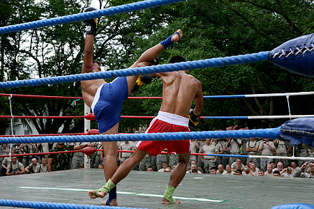 two men kickboxing inside ring thumbnail