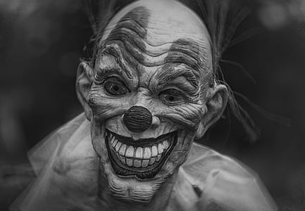 grayscale photo of clown thumbnail