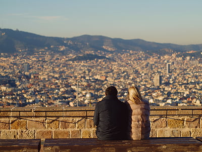 couple sitting on ledge thumbnail