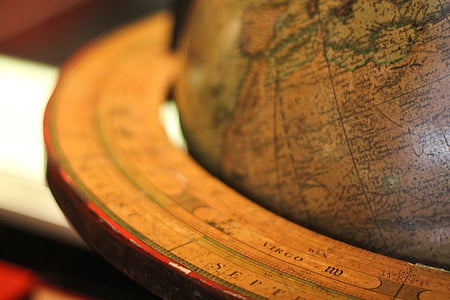 brown wooden desk globe thumbnail