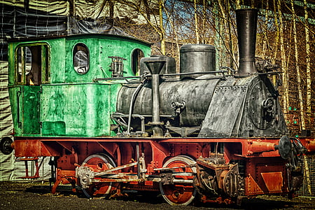 green and black train during daytime thumbnail