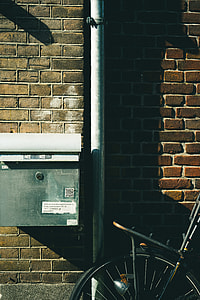 bicycle park beside concrete wall thumbnail