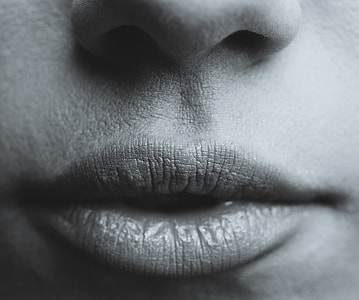 grayscale close-up photography of human lips thumbnail