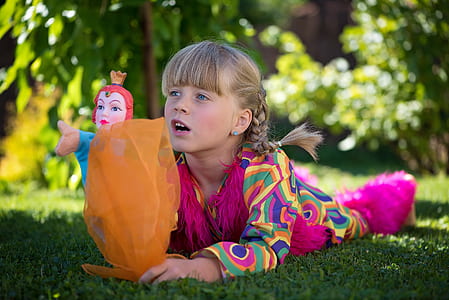 girl wearing pink and yellow long-sleeved shirt and pants thumbnail