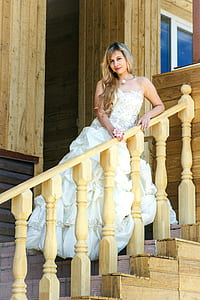 woman standing on stair thumbnail