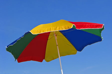 low-angle photography of white and multicolored patio umbrella thumbnail