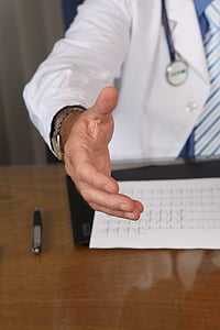 man wearing white coat and silver watch thumbnail