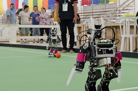 black and gray robot standing in front of robot thumbnail