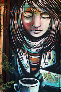 girl with cup of coffee on her front painting thumbnail