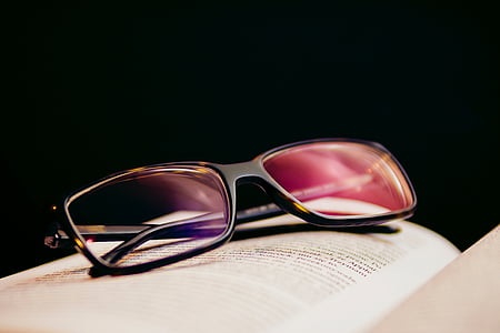 black framed eyeglasses on book page thumbnail