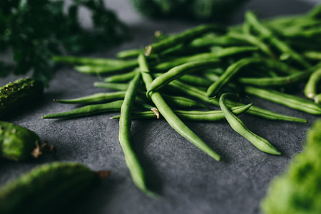 Parslel, cucumbers, green peas, and other greenery thumbnail