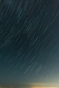 stars on the sky in time lapse photography thumbnail