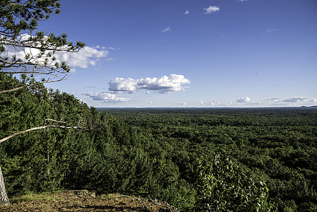 Clouds over the forest at Levis Mound, Wisconsin thumbnail