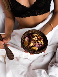 woman holding brown with salad thumbnail