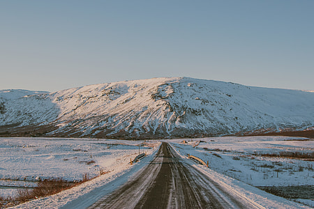mountain covered with snow during daytime thumbnail