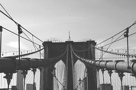 grayscale photo of suspension bridge thumbnail